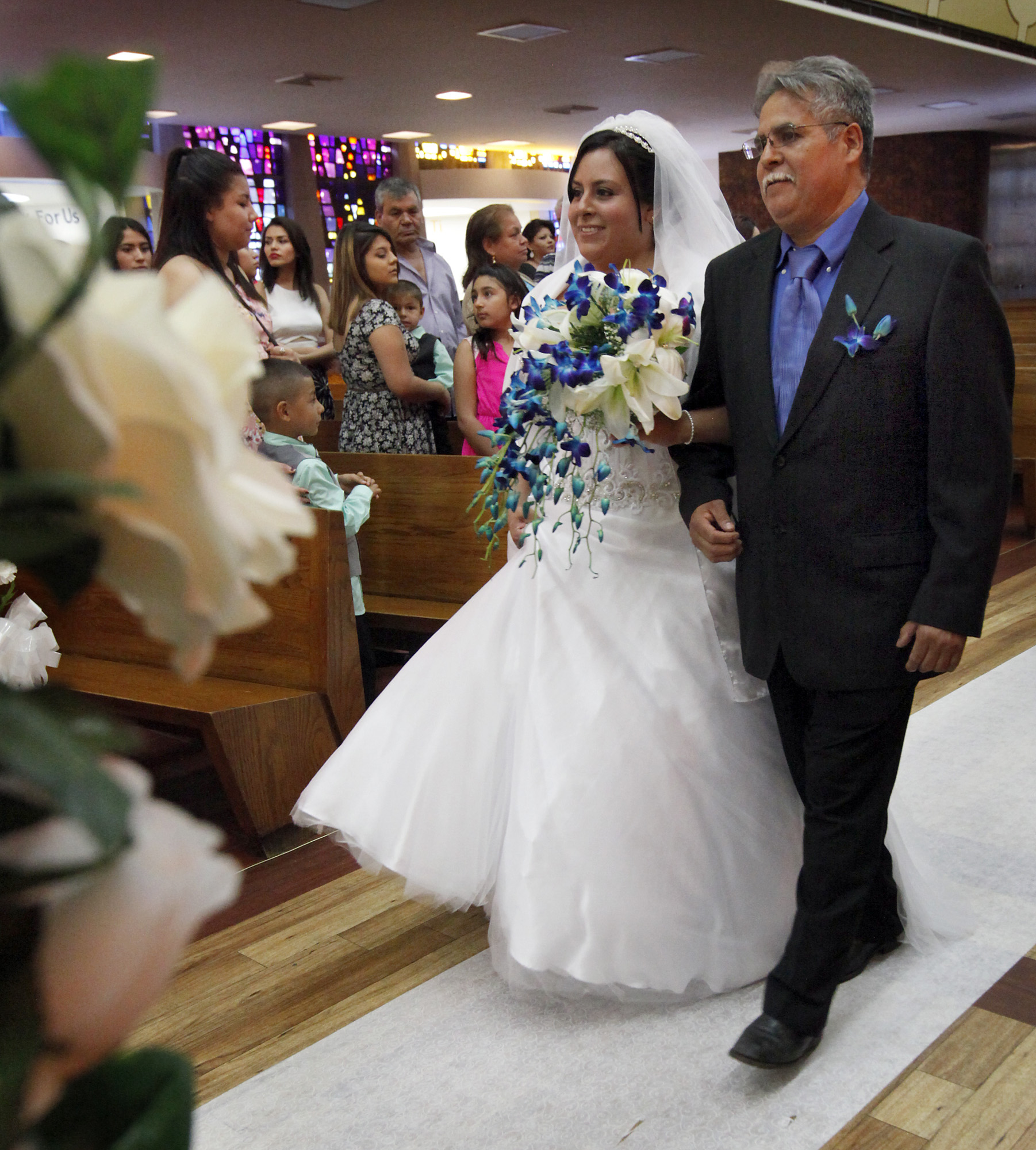 Nine couples receive blessings at community wedding